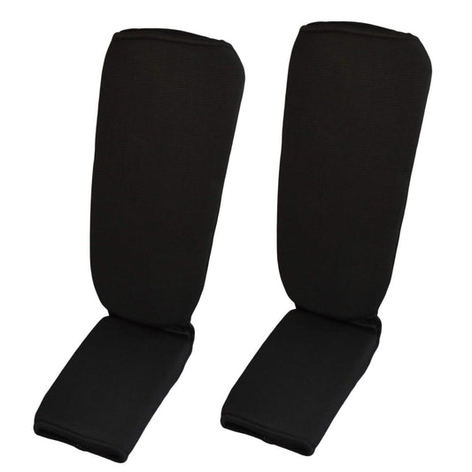 Schienbein- Spannschoner Stoff schwarz ergonomische Passform – mit Klettverschluss