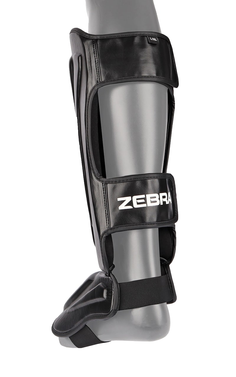 ZEBRA Schienbein- Spannschützer Pro PU - Vorgegrümmt, extra brelte Klettbänder - MMA, Kickboxen